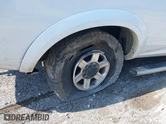 2013 Ram 2500 Laramie Longhorn with VIN 3C6UR5LL7DG522840, listed as a IAAI auction lot 41970385 with 145,144 mi miles and . Bid and sale history available at DreamBid. Image 21.