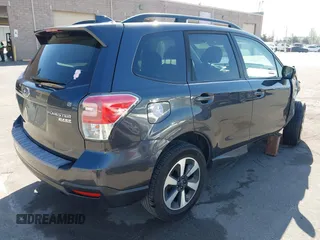 2017 Subaru Forester Premium with VIN JF2SJAGC8HH590684, listed as a IAAI auction lot 42136061 with 59,797 mi miles and . Bid and sale history available at DreamBid. Image 4.