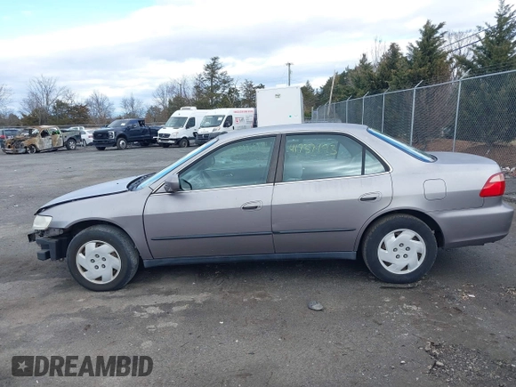 2000 Honda Accord LX z VIN 1HGCG1649YA096212, wystawiony jako IAAI lot #41737193 z przebiegiem 181 489 mil mil oraz . Historia ofert i sprzedaży dostępna na DreamBid. Obrazek 14.