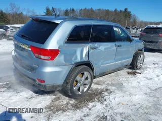 2013 Jeep Grand Cherokee Overland with VIN 1C4RJFCTXDC541770, listed as a IAAI auction lot 41610600 with 164,065 mi miles. Bid and sale history available at carsss.com. Image 4.