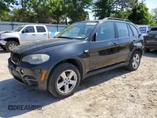 2012 BMW X5 35i z VIN 5UXZV4C52CL748838, wystawiony jako Copart lot #58051155 z przebiegiem 224 088 mil mil oraz Czysty tytuł • Clean title. Historia ofert i sprzedaży dostępna na DreamBid. Obrazek 1.