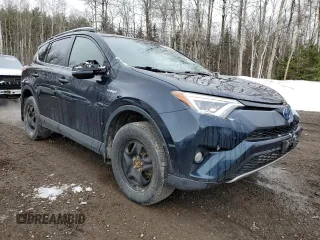 2018 Toyota RAV4 Hybrid SE with VIN JTMJJREV6JD225530, listed as a Copart auction lot 52000985 with 150,642 mi miles and Salvage title. Bid and sale history available at DreamBid. Image 4.