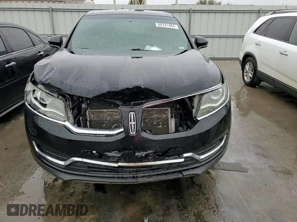 2016 Lincoln MKX Select with VIN 2LMTJ6KR6GBL50573, listed as a Copart auction lot 82331484 with 129,121 mi miles and Salvage Title. Bid and sale history available at carsss.com. Image 12.