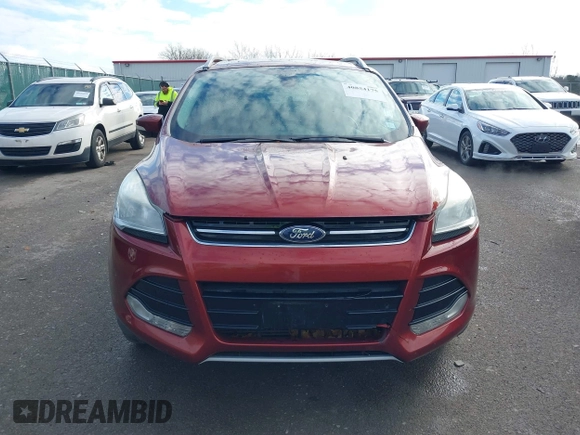 2015 Ford Escape Titanium with VIN 1FMCU9J91FUA26624, listed as a IAAI auction lot 40854175 with 132,313 mi miles. Bid and sale history available at carsss.com. Image 12.