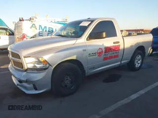 2018 Ram 1500 Tradesman with VIN 3C6JR6AG0JG146069, listed as a IAAI auction lot 40372964 with 153,376 mi miles and . Bid and sale history available at DreamBid. Image 2.