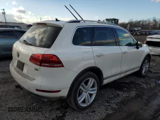 2012 Volkswagen Touareg Sport z VIN WVGFK9BP6CD002427, wystawiony jako Copart lot #42576335 z przebiegiem 167 936 mil mil oraz Szkoda całkowita • Salvage title. Historia ofert i sprzedaży dostępna na DreamBid. Obrazek 3.