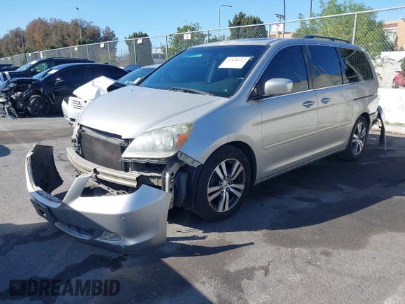 2005 Honda Odyssey TOURING with VIN 5FNRL38865B128519, listed as a IAAI auction lot 41830182 with 171,010 mi miles. Bid and sale history available at carsss.com. Image 20.