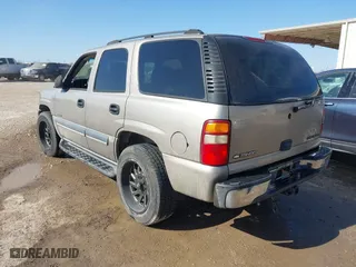 2003 Chevrolet Tahoe LS with VIN 1GNEC13V03R302664, listed as a IAAI auction lot 41772648 with 270,634 mi miles. Bid and sale history available at carsss.com. Image 3.