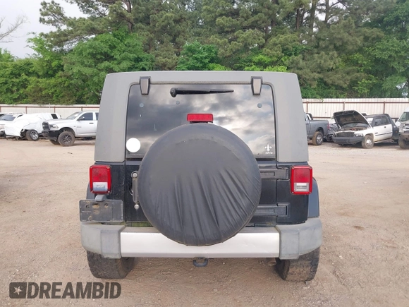 2008 Jeep Wrangler Unlimited Sahara with VIN 1J4GB591X8L523581, listed as a IAAI auction lot 42035446 with 200,570 mi miles and . Bid and sale history available at DreamBid. Image 17.