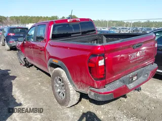2024 GMC Canyon 4WD AT4X with VIN 1GTP6EEK1R1247720, listed as a IAAI auction lot 41571103 with 10,618 mi miles. Bid and sale history available at carsss.com. Image 3.