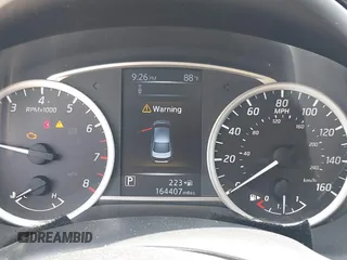 2018 Nissan Sentra SV with VIN 3N1AB7AP4JL641839, listed as a IAAI auction lot 41765372 with 164,407 mi miles and . Bid and sale history available at DreamBid. Image 7.