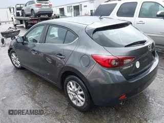 2014 Mazda 3 i Touring with VIN JM1BM1L76E1184728, listed as a IAAI auction lot 41962258 with 200,544 mi miles and . Bid and sale history available at DreamBid. Image 3.