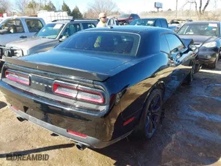2018 Dodge Challenger R/T Plus with VIN 2C3CDZBT1JH122056, listed as a IAAI auction lot 41688752 with 23,774 mi miles. Bid and sale history available at carsss.com. Image 4.