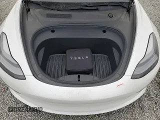 2021 Tesla Model 3 Standard Range Plus z VIN 5YJ3E1EAXMF065760, wystawiony jako Copart lot #54235345 z przebiegiem 54 413 mil mil oraz Szkoda całkowita • Salvage title. Historia ofert i sprzedaży dostępna na DreamBid. Obrazek 11.