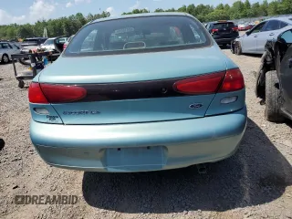 1998 Ford Escort LX with VIN 1FAFP10P1WW198981, listed as a Copart auction lot 60413215 with 82,113 mi miles and Salvage title. Bid and sale history available at DreamBid. Image 6.