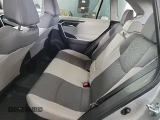 2023 Toyota RAV4 Hybrid XLE with VIN 2T3RWRFV9PW175446, listed as a IAAI auction lot 42806880 with 90,261 mi miles and . Bid and sale history available at DreamBid. Image 3.