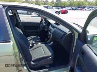 2008 Ford Focus SE with VIN 1FAHP35N98W252459, listed as a IAAI auction lot 42020107 with 173,210 mi miles. Bid and sale history available at carsss.com. Image 5.