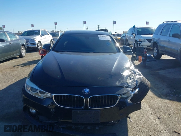 2014 BMW 4 Series 428i with VIN WBA3N7C55EK221259, listed as a IAAI auction lot 41322781 with 100,274 mi miles and . Bid and sale history available at carsss.com. Image 12.