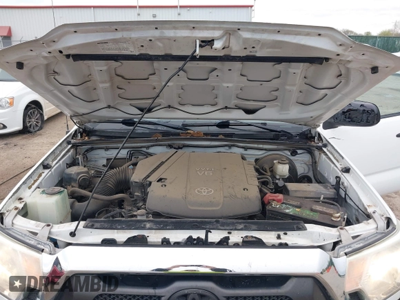 2014 Toyota Tacoma with VIN 3TMLU4EN8EM139665, listed as a IAAI auction lot 41925143 with 190,690 mi miles and . Bid and sale history available at DreamBid. Image 10.