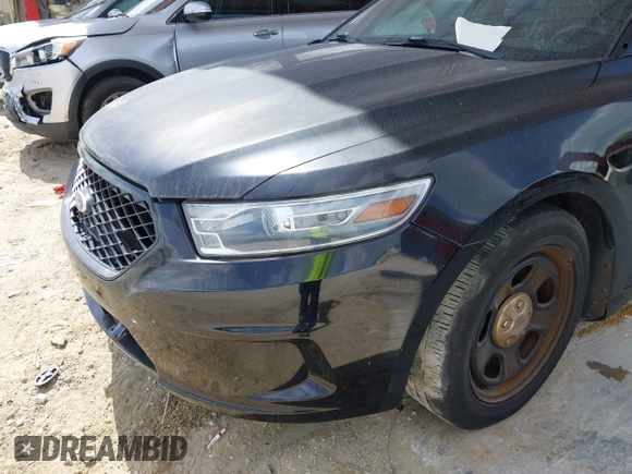 2013 Ford Police Interceptor z VIN 1FAHP2M81DG116904, wystawiony jako IAAI lot #42458831 z przebiegiem 120 614 mil mil oraz . Historia ofert i sprzedaży dostępna na DreamBid. Obrazek 13.