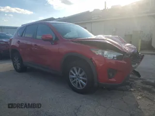 2015 Mazda CX-5 Touring with VIN JM3KE4CY8F0484177, listed as a Copart auction lot 51303395 with 113,307 mi miles and Non Repairable. Bid and sale history available at DreamBid. Image 4.