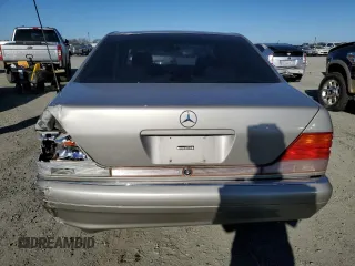 1996 Mercedes-Benz S with VIN WDBGA43E9TA311921, listed as a Copart auction lot 88758965 with 141,035 mi miles and Salvage Title. Bid and sale history available at DreamBid. Image 6.