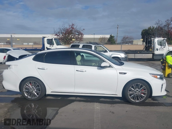 2016 Kia Optima SXL Turbo with VIN 5XXGV4L20GG074869, listed as a IAAI auction lot 41212808 with 82,884 mi miles. Bid and sale history available at carsss.com. Image 14.