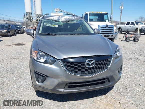2014 Mazda CX-5 Grand Touring with VIN JM3KE4DY3E0368169, listed as a IAAI auction lot 41857976 with 127,853 mi miles. Bid and sale history available at carsss.com. Image 12.