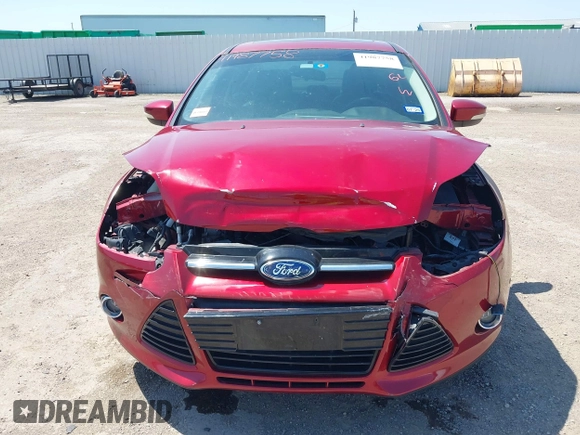 2013 Ford Focus Titanium with VIN 1FADP3J23DL334161, listed as a IAAI auction lot 41987758 with 117,665 mi miles and . Bid and sale history available at carsss.com. Image 6.