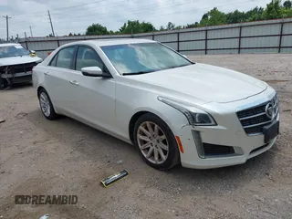 2014 Cadillac CTS Luxury RWD z VIN 1G6AR5SX9E0130676, wystawiony jako IAAI lot #42297029 z przebiegiem 189 922 mil mil oraz . Historia ofert i sprzedaży dostępna na DreamBid. Obrazek 1.