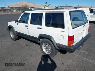 1996 Jeep Cherokee Sport with VIN 1J4FJ68S9TL234764, listed as a IAAI auction lot 41636731 with 129,732 mi miles. Bid and sale history available at carsss.com. Image 3.