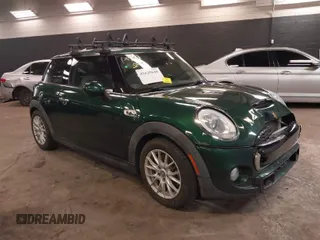 2014 MINI Hardtop S with VIN WMWXM7C55ET987040, listed as a IAAI auction lot 41625649 with 99,250 mi miles and . Bid and sale history available at DreamBid. Image 1.