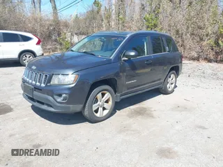 2014 Jeep Compass Sport with VIN 1C4NJDBB4ED689503, listed as a IAAI auction lot 42079098 with 104,433 mi miles. Bid and sale history available at carsss.com. Image 2.
