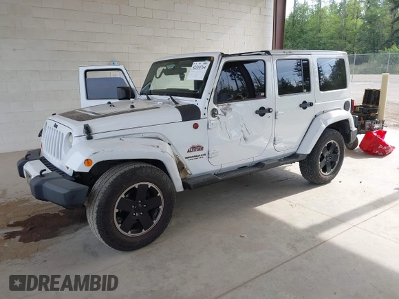 2012 Jeep Wrangler Unlimited Sahara with VIN 1C4BJWEG7CL275883, listed as a IAAI auction lot 42510764 with 149,531 mi miles and . Bid and sale history available at DreamBid. Image 18.