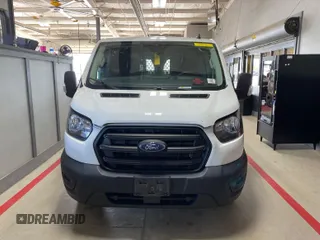 2020 Ford Transit Cargo with VIN 1FTBR1Y87LKA53852, listed as a IAAI auction lot 42300106 with 89,023 mi miles and . Bid and sale history available at DreamBid. Image 16.