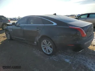 2014 Jaguar XJ with VIN SAJWJ2GD6E8V73491, listed as a Copart auction lot 42472345 with 68,747 mi miles and Salvage Title. Bid and sale history available at carsss.com. Image 2.