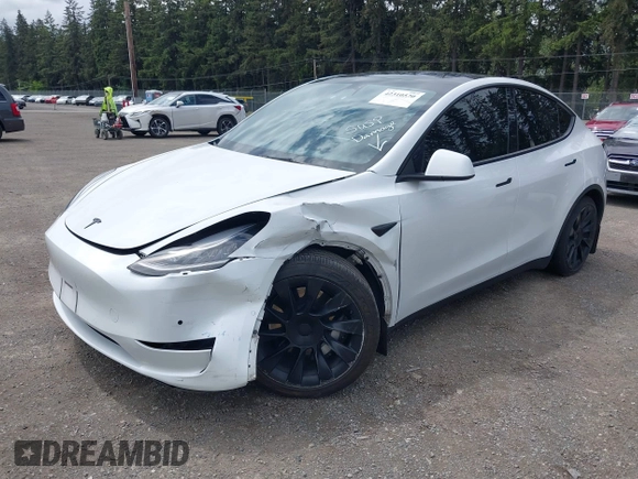 2022 Tesla Model Y Long Range z VIN 7SAYGDEE9NF494901, wystawiony jako IAAI lot #42310520 z przebiegiem 62 515 mil mil oraz . Historia ofert i sprzedaży dostępna na DreamBid. Obrazek 19.