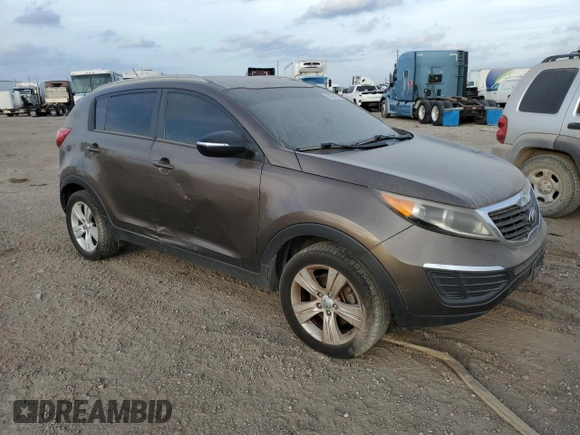 2013 Kia Sportage LX z VIN KNDPB3A23D7465413, wystawiony jako Copart lot #83694894 z przebiegiem 122 467 mil mil oraz Szkoda całkowita • Salvage title. Historia ofert i sprzedaży dostępna na DreamBid. Obrazek 4.