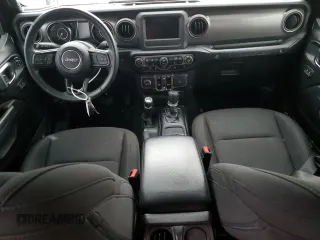 2023 Jeep Wrangler Sport S with VIN 1C4HJXDN1PW596242, listed as a Copart auction lot 82020314 with 30,061 mi miles and Salvage title. Bid and sale history available at DreamBid. Image 8.