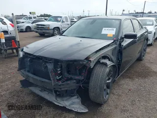 2023 Chrysler 300 Touring with VIN 2C3CCAAG4PH577551, listed as a IAAI auction lot 41364688 with 25,186 mi miles and . Bid and sale history available at DreamBid. Image 2.