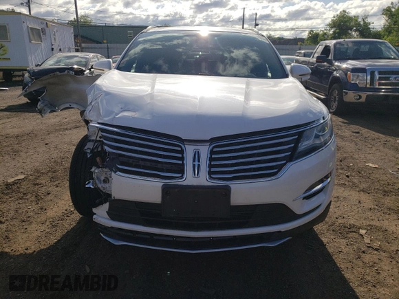 2018 Lincoln MKC Reserve z VIN 5LMCJ3D94JUL13544, wystawiony jako Copart lot #61193235 z przebiegiem 28 353 mil mil oraz Szkoda całkowita • Salvage title. Historia ofert i sprzedaży dostępna na DreamBid. Obrazek 5.
