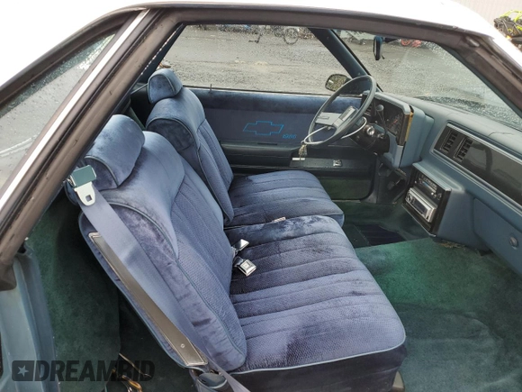 1986 Chevrolet El Camino z VIN 3GCCW80Z5GS902512, wystawiony jako Copart lot #78267624 z przebiegiem 15 481 mil mil oraz Szkoda całkowita • Salvage title. Historia ofert i sprzedaży dostępna na DreamBid. Obrazek 10.