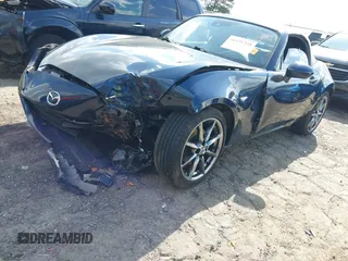 2021 Mazda MX-5 Miata Grand Touring с VIN JM1NDAD79M0457032, выставлен на аукционе IAAI как лот 41931348 с пробегом 47 874 миль миль и . История ставок и продаж доступна на DreamBid. Изображение 17.