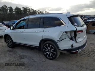 2021 Honda Pilot Touring 8-Passenger with VIN 5FNYF5H92MB001840, listed as a Copart auction lot 43236895 with 63,402 mi miles and Salvage Title. Bid and sale history available at DreamBid. Image 2.