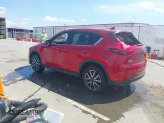 2018 Mazda CX-5 Grand Touring with VIN JM3KFBDM6J0424663, listed as a IAAI auction lot 42003207 with 95,442 mi miles and . Bid and sale history available at DreamBid. Image 3.