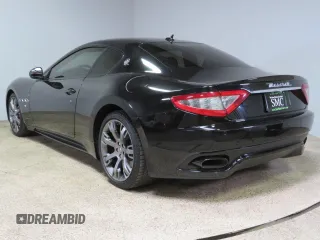 2013 Maserati GranTurismo Sport с VIN ZAM45VLAXD0072023, выставлен на аукционе Copart как лот 78521144 с пробегом 86 008 миль миль и Списание • Salvage title. История ставок и продаж доступна на DreamBid. Изображение 4.