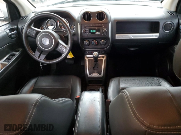 2014 Jeep Compass Latitude with VIN 1C4NJCEB6ED659912, listed as a Copart auction lot 84479464 with 187,311 mi miles and Salvage Title. Bid and sale history available at carsss.com. Image 8.