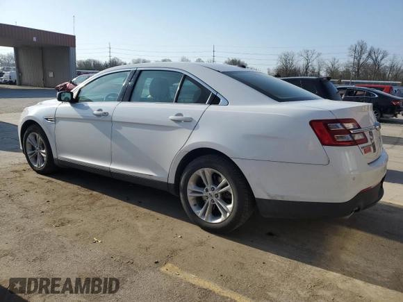 2016 Ford Taurus SEL with VIN 1FAHP2H89GG122884, listed as a Copart auction lot 53597595 with 128,627 mi miles and Salvage title. Bid and sale history available at DreamBid. Image 2.