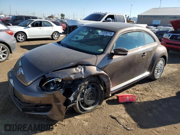2015 Volkswagen Beetle with VIN 3VWH17AT3FM604193, listed as a Copart auction lot 72023304 with 49,958 mi miles and Salvage Title. Bid and sale history available at DreamBid. Image 1.