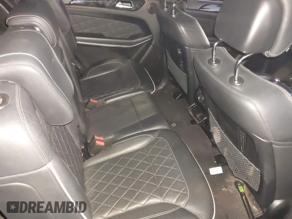 2014 Mercedes-Benz GL-Class GL 550 with VIN 4JGDF7DE9EA329761, listed as a IAAI auction lot 41651533 with 113,056 mi miles. Bid and sale history available at carsss.com. Image 8.